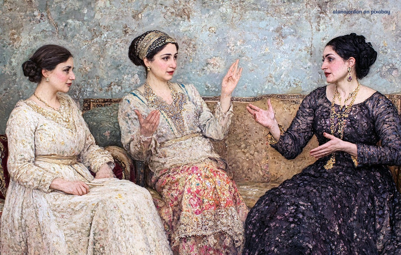 Alt Text: A painted scene of three women sitting together on a patterned sofa, leaning in as they share an intimate, heartfelt conversation. Their expressions are serious yet open, suggesting honesty, reflection, and emotional truth.